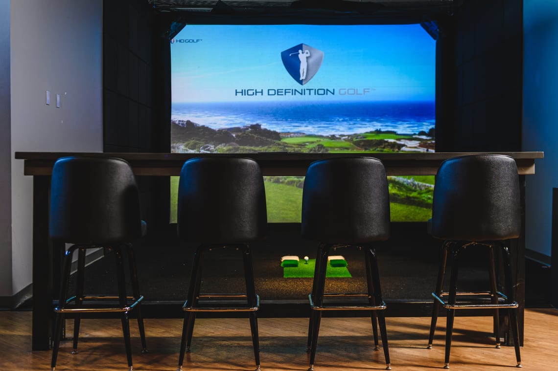 Bucket bar stools in a modern sports bar