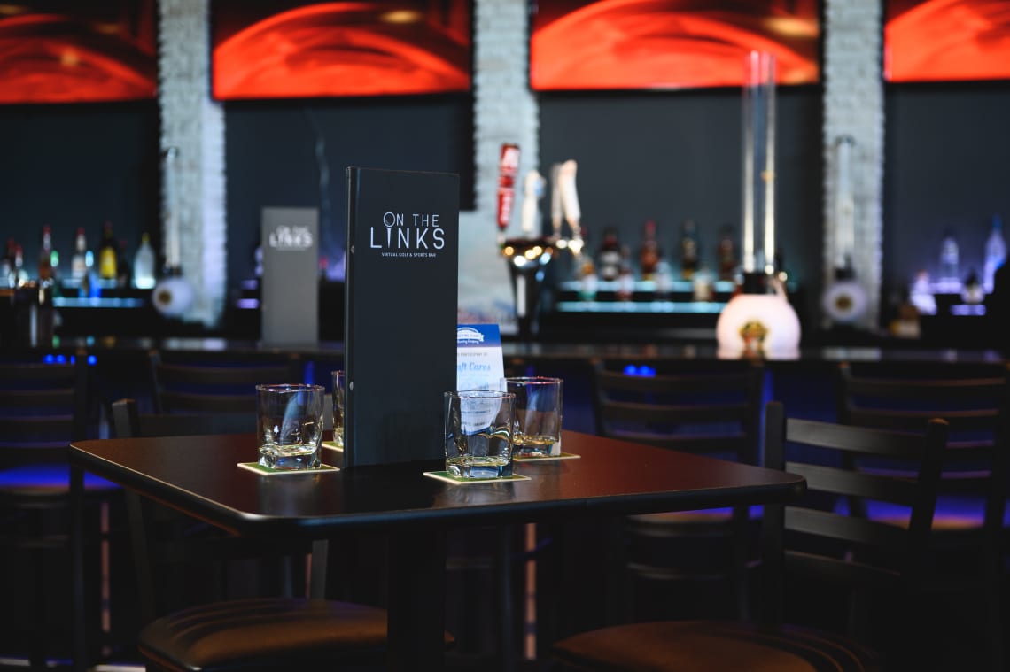 Reversible table tops in a sports bar