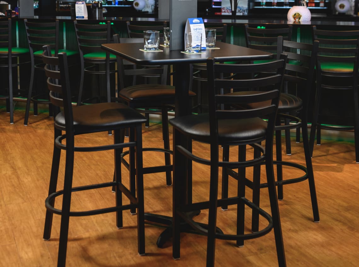 Modern sports bar with ladder back bar stools