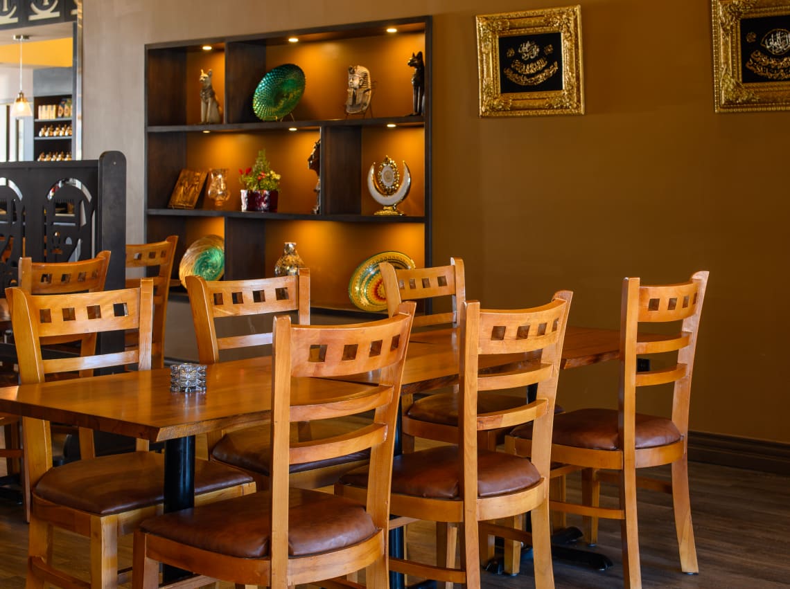 wood chairs and tables in an upscale restaurant