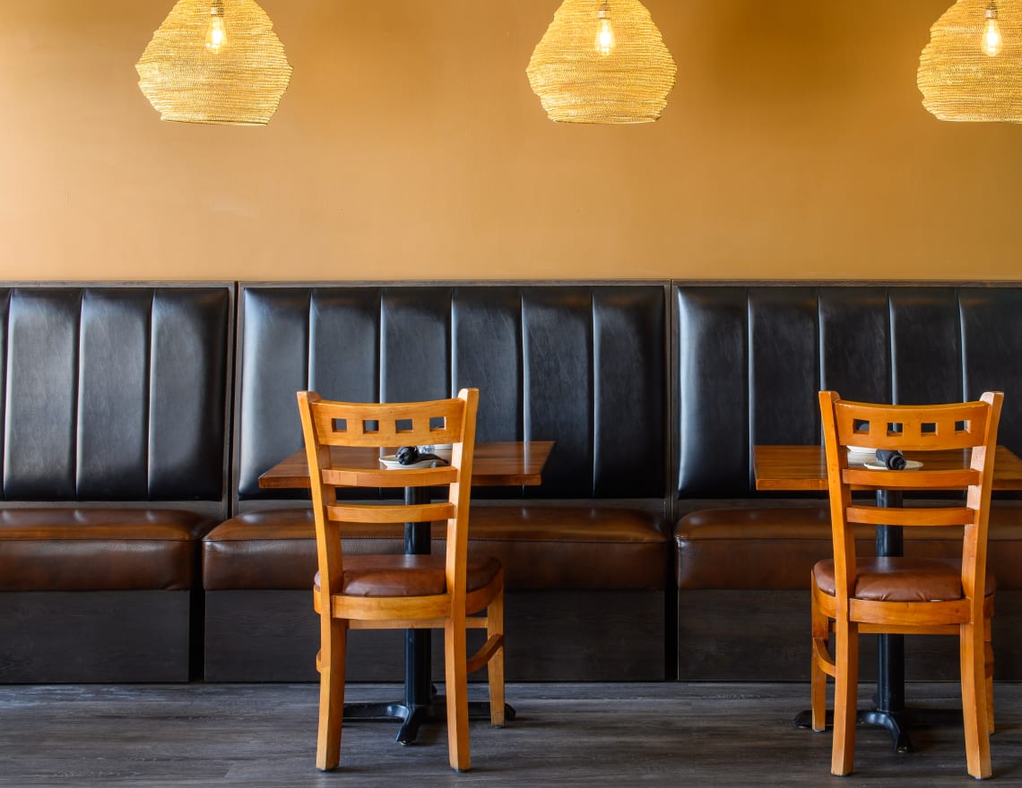 upholstered wall benches in an upscale restaurant